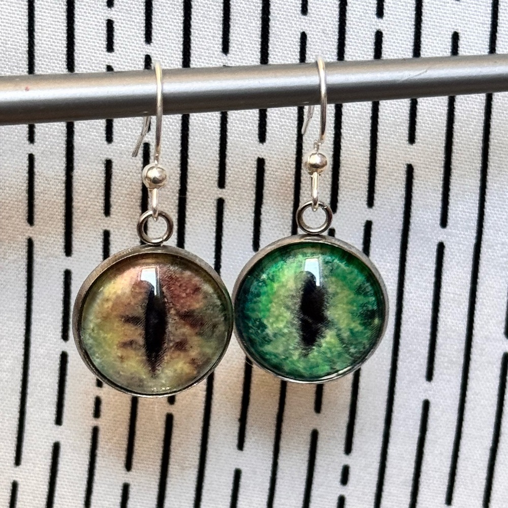 Green and Brown Mythical Creature Cat Eye Silver Earrings